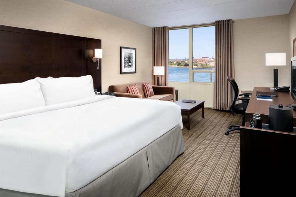Deluxe, Guest room, 1 King, Sofa bed, Water view